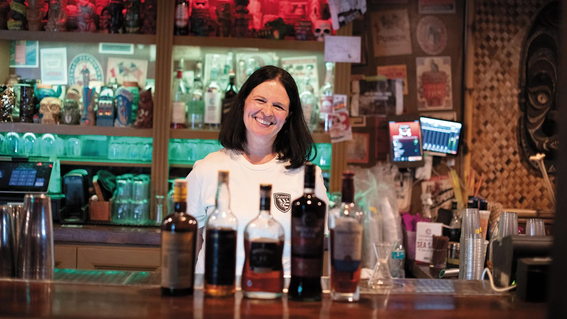 Manager Alena Aaron at Dr. Funk with a lineup of her favorite rums